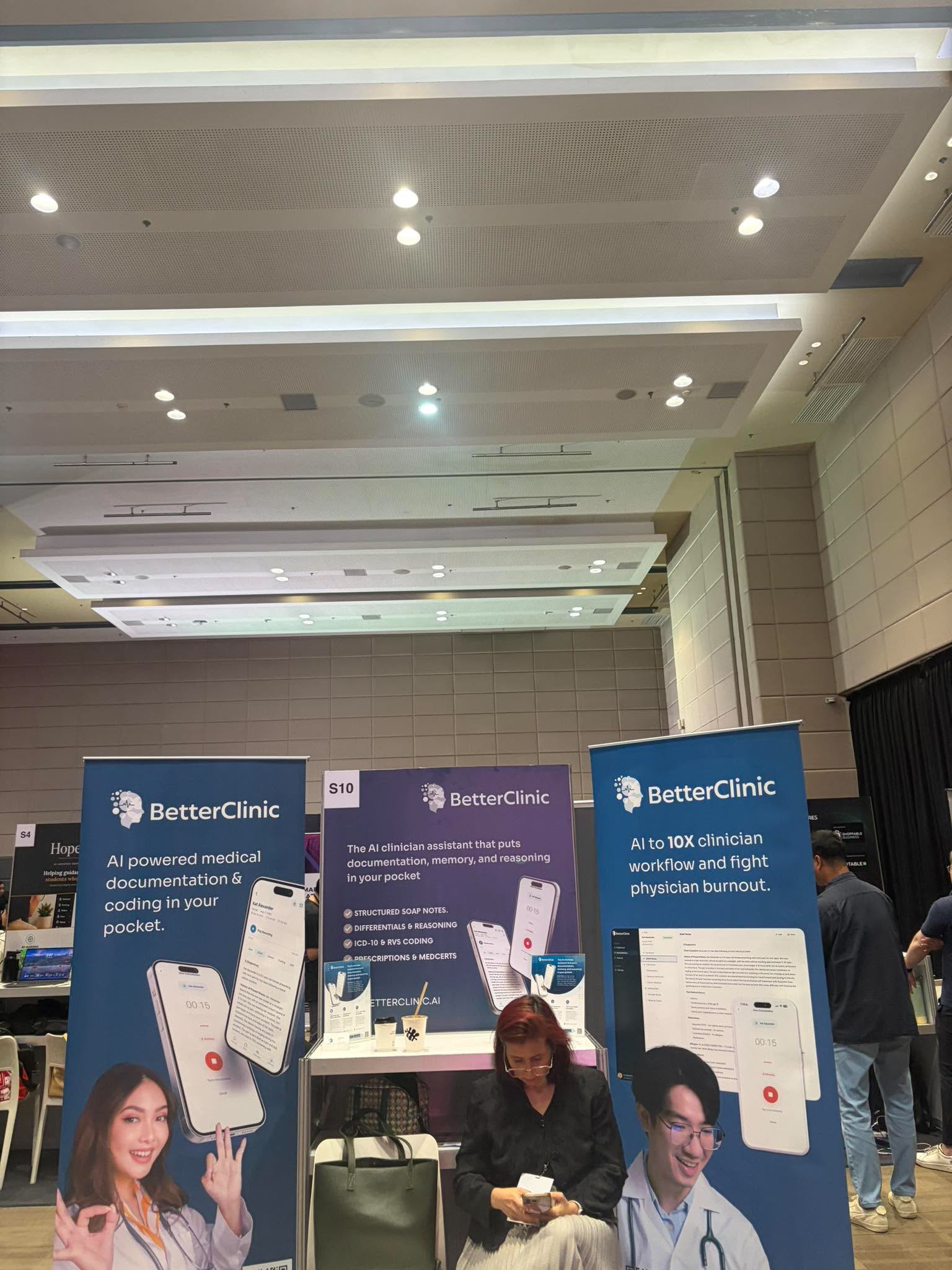 BetterClinic booth presenting AI-powered medical documentation tools