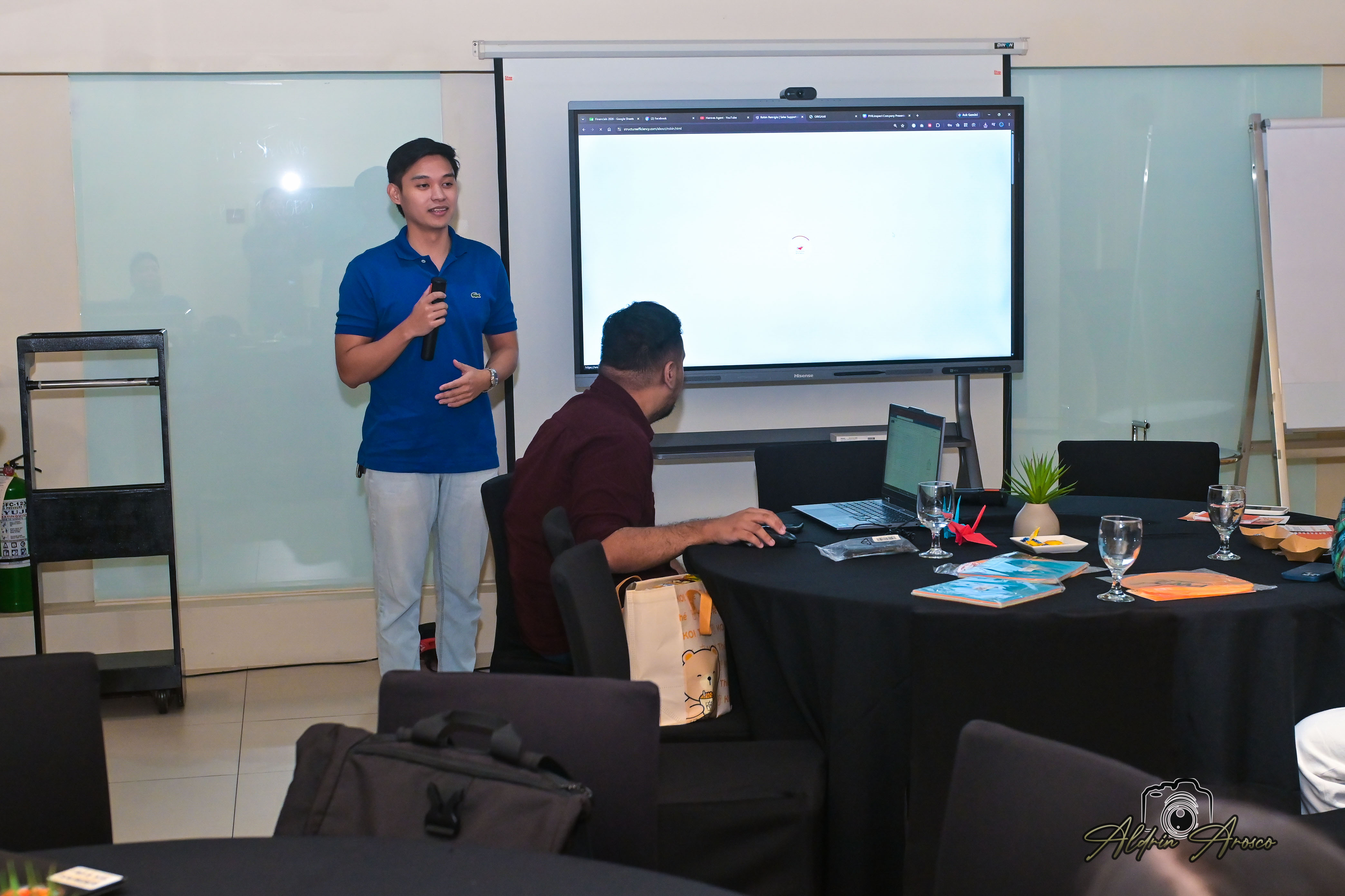 Robin Remigio presenting at the event